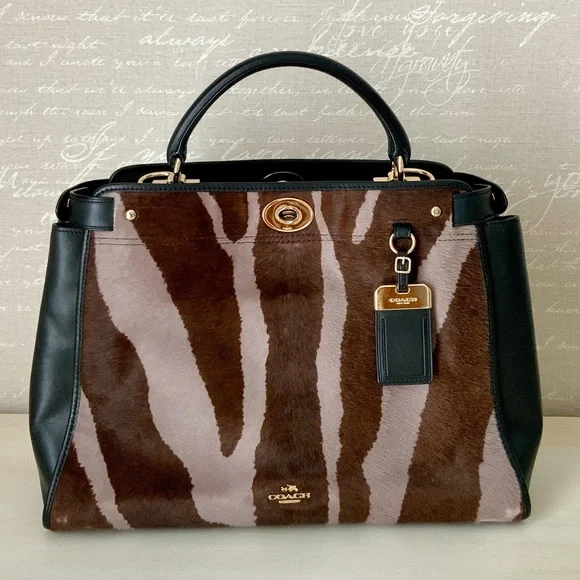 Coach,calf hair and leather top handle
Bag - Picture 13 of 14